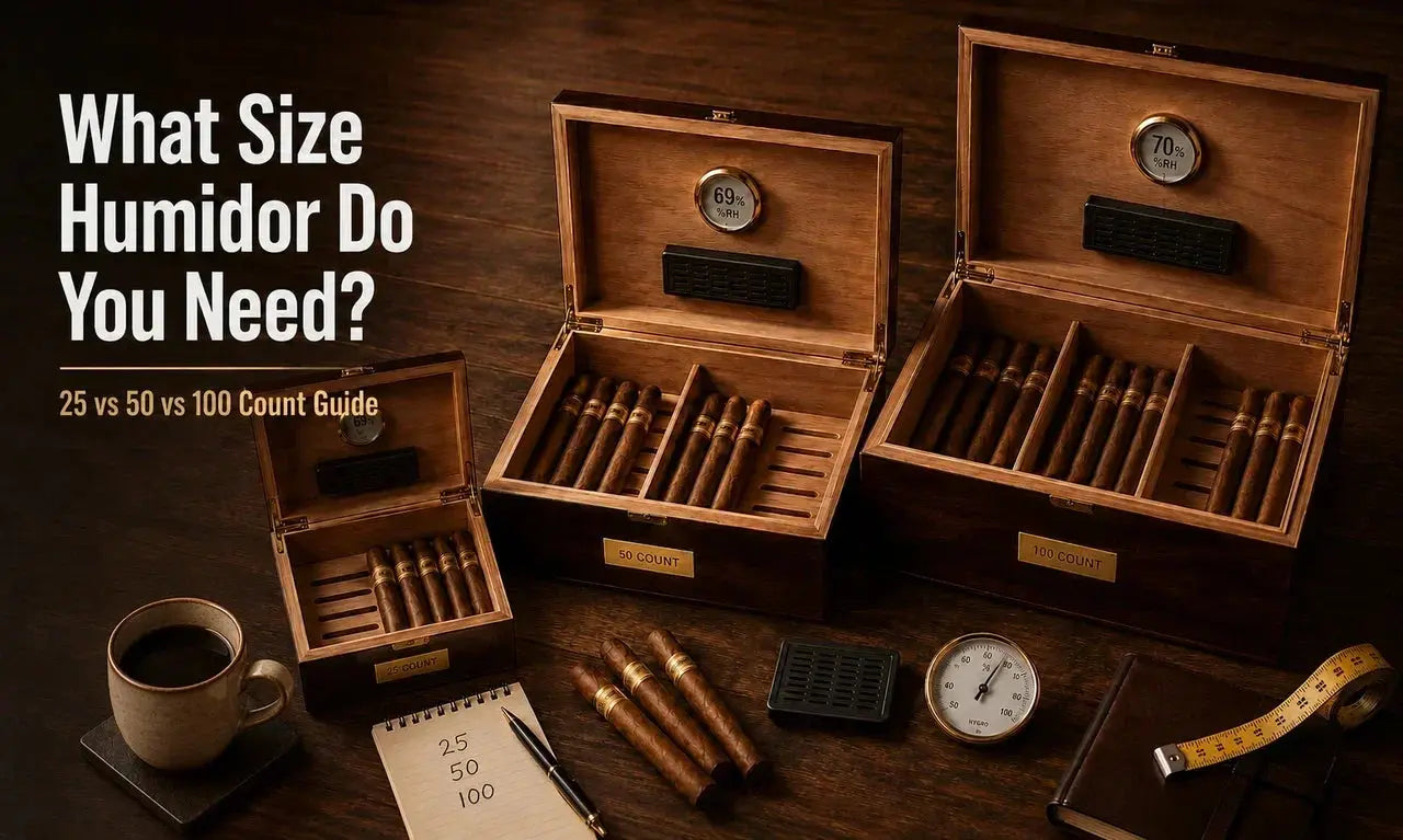 Different size cigar humidors including 25-count, 50-count, and 100-count options on a wooden desk with cigars and a hygrometer.